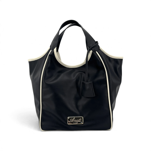 Borsa a mano Amatì modello Nuvola in pelle nera con profili a contrasto color crema e placca logo dorata