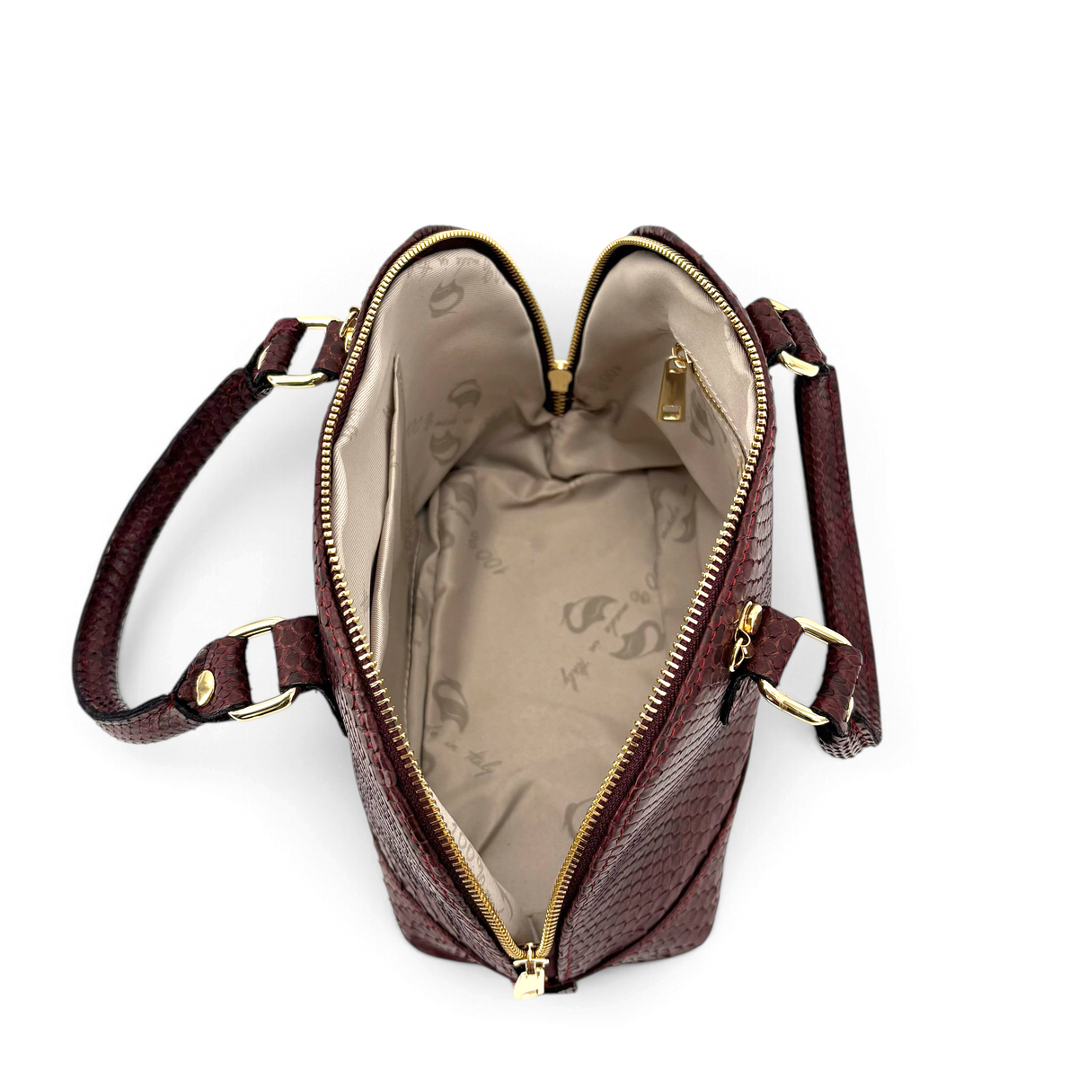 Borsa Amatì Rubina in vero pitone bordeaux con interno foderato, zip dorata e doppi manici, vista dall'alto.