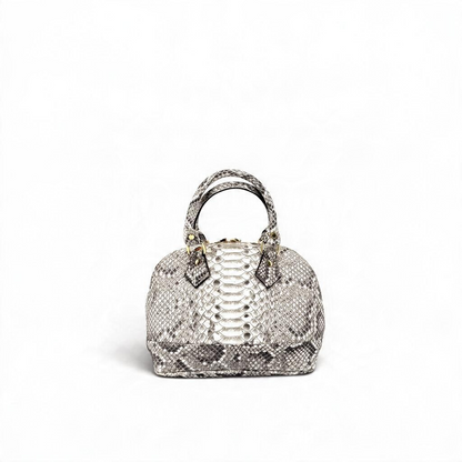 Borsa Amatì Rubina a cupola in vero pitone con dettagli dorati e doppi manici, artigianato Made in Italy.