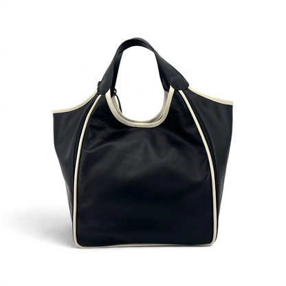 Borsa tote Amatì Nuvola in pelle nera con profili a contrasto color crema e manici integrati