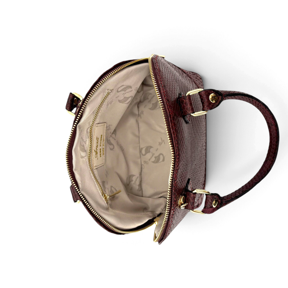 Borsa Amatì Rubina a cupola in vero pitone bordeaux con interno foderato, tasca con zip e dettagli dorati.